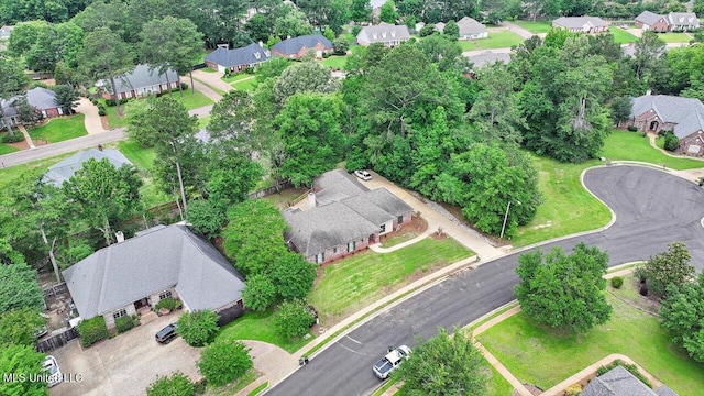 207 Keystone Pl, Brandon, MS 39042 - aerial overview of property's location featuring nearby suburban area and a tree filled landscape