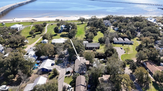 drone / aerial view with a residential view and a water view