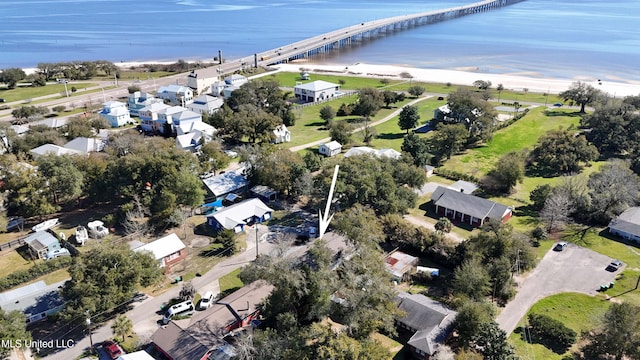 drone / aerial view with a residential view and a water view