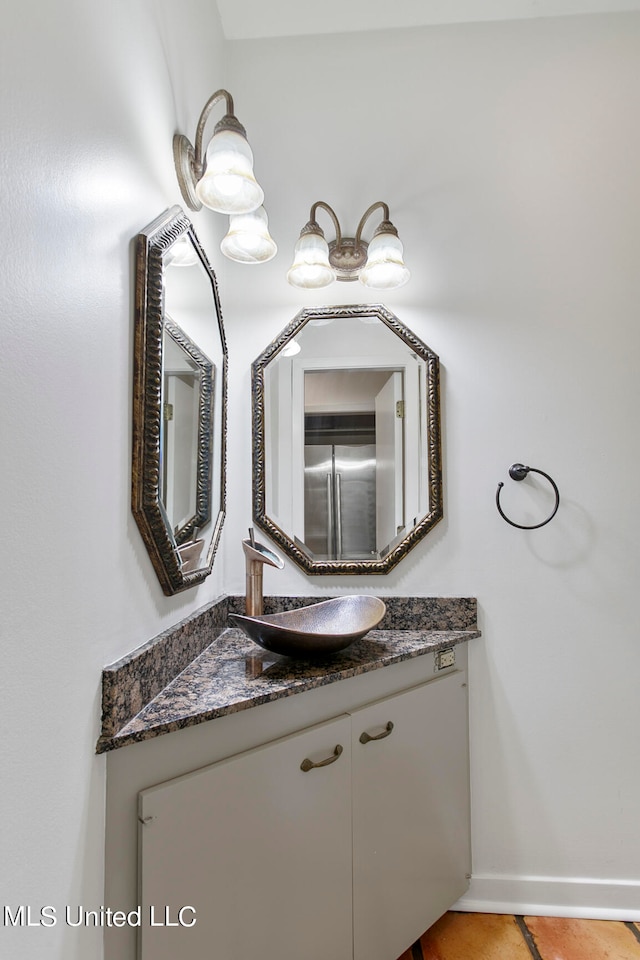 bathroom with vanity and tile patterned floors