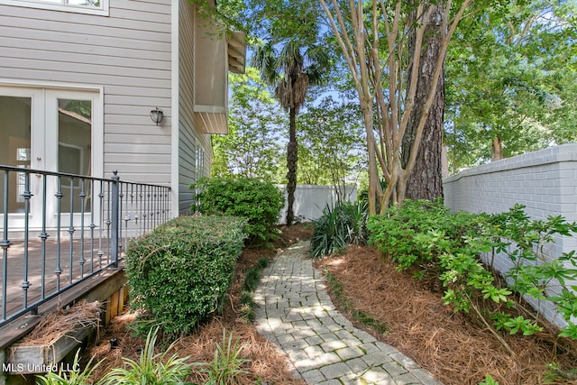 view of yard featuring french doors