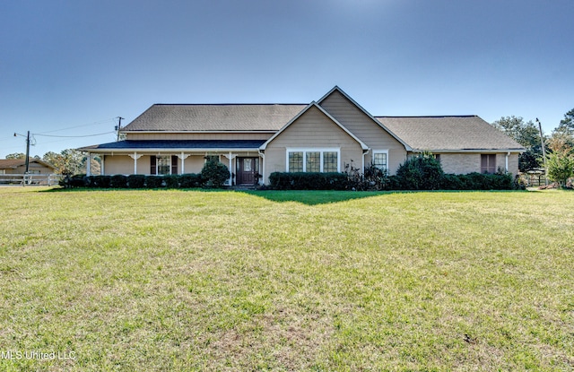 single story home with a front yard