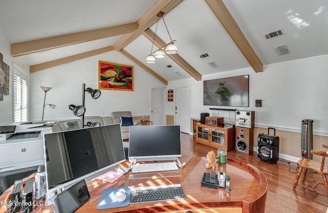 living room with vaulted ceiling with beams and wood-type flooring