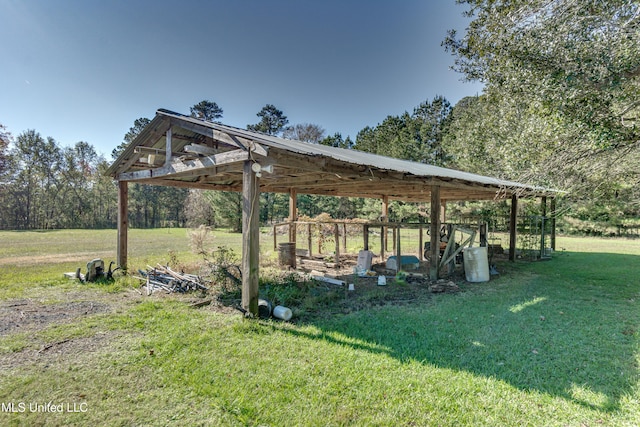 view of home's community featuring a lawn