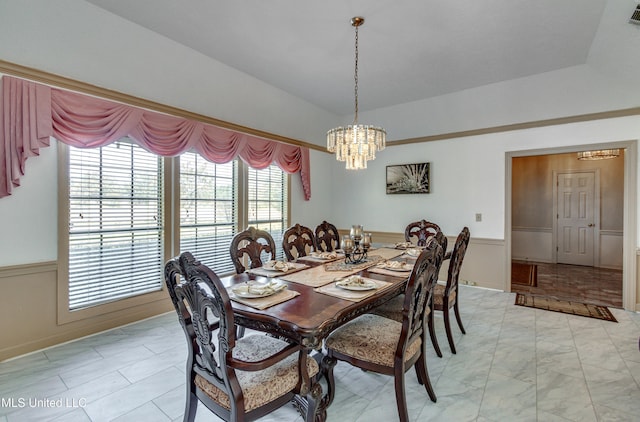 dining space with a notable chandelier