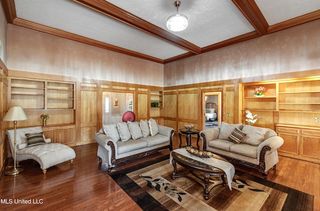 living room featuring built in shelves, beamed ceiling, and dark wood-type flooring