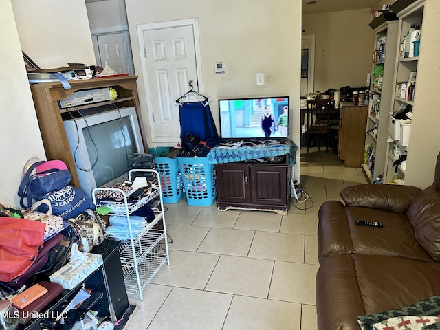 living room featuring light tile patterned flooring