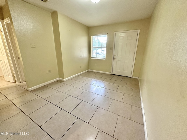 view of tiled empty room