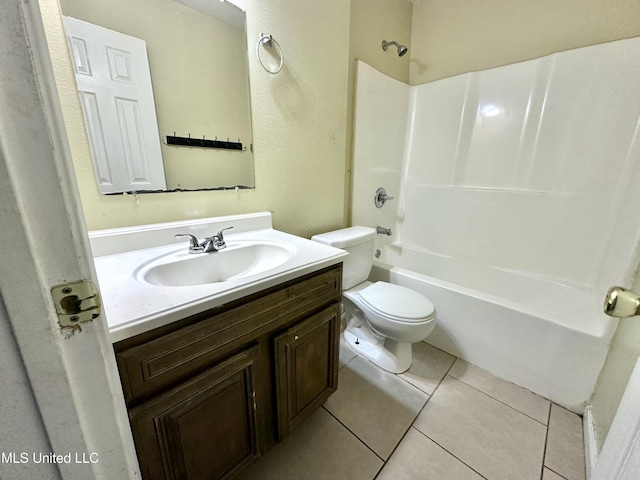 full bathroom featuring vanity,  shower combination, tile patterned floors, and toilet