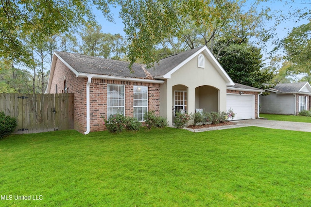 view of front of home featuring a garage and a front lawn