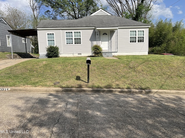 3715 Parkview St, Vicksburg, MS 39180 - view of front facade with a front yard, concrete driveway, an attached carport, a shingled roof, and crawl space