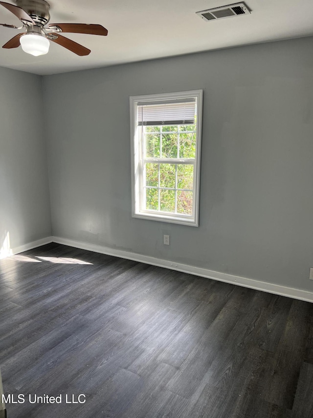 3715 Parkview St, Vicksburg, MS 39180 - unfurnished room with dark wood finished floors, baseboards, and visible vents