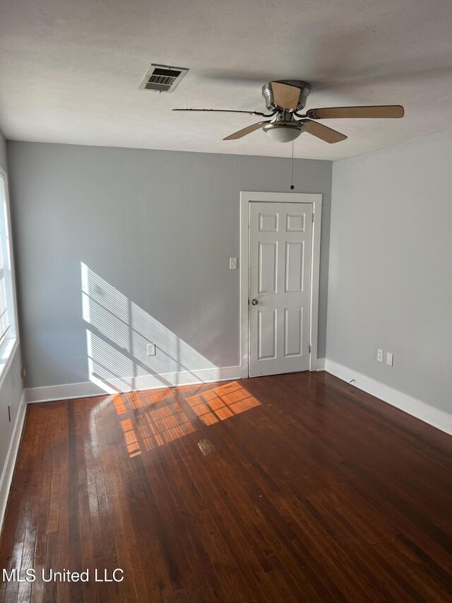 3715 Parkview St, Vicksburg, MS 39180 - empty room with baseboards, visible vents, ceiling fan, and wood-type flooring