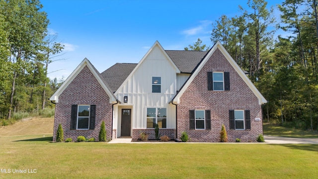 view of front of property with a front lawn