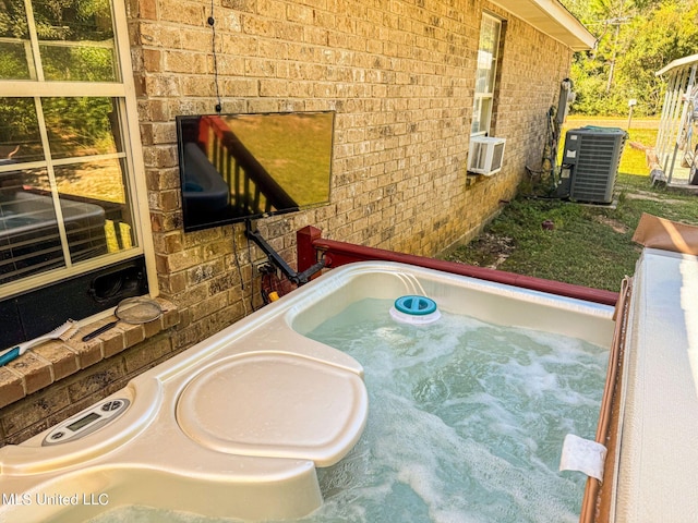 details featuring central air condition unit and a jacuzzi