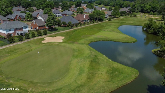 birds eye view of property featuring a water view, golf course view, and a residential view