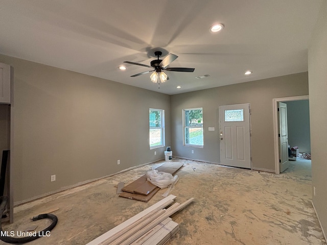 interior space featuring ceiling fan