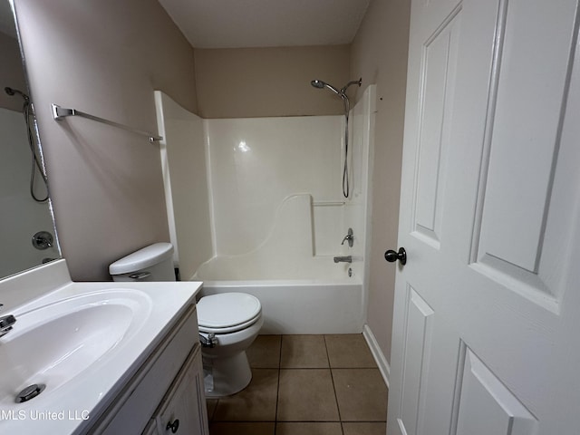 bathroom featuring tile patterned flooring, shower / bathing tub combination, vanity, and toilet