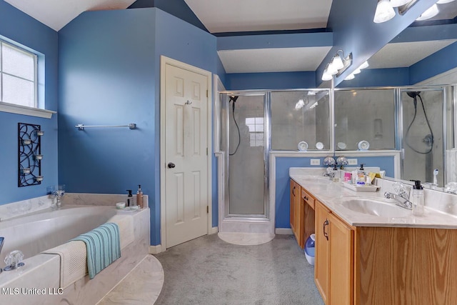 full bathroom with a sink, double vanity, baseboards, a shower stall, and a garden tub