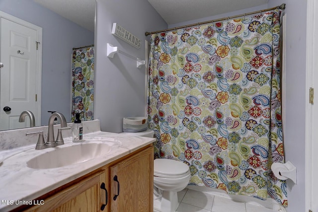 bathroom with tile patterned floors, vanity, curtained shower, and toilet