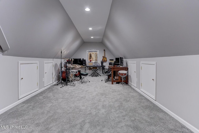 carpeted office space with recessed lighting, vaulted ceiling, and baseboards