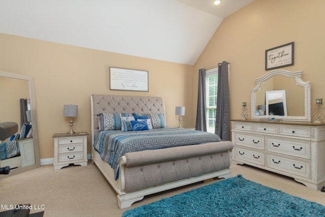 48 Harrell Rd, Hattiesburg, MS 39401 - bedroom featuring light colored carpet, lofted ceiling, and baseboards