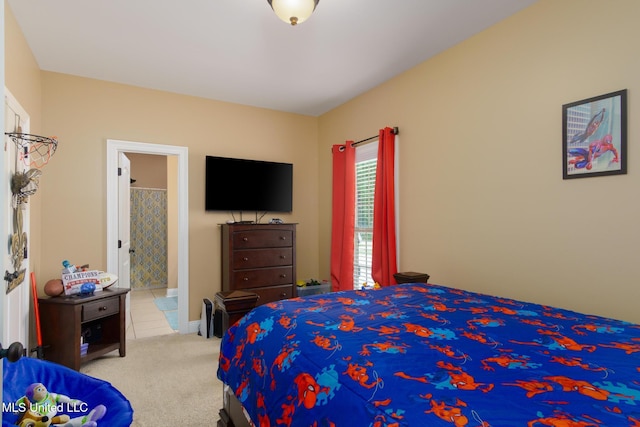 48 Harrell Rd, Hattiesburg, MS 39401 - carpeted bedroom with connected bathroom