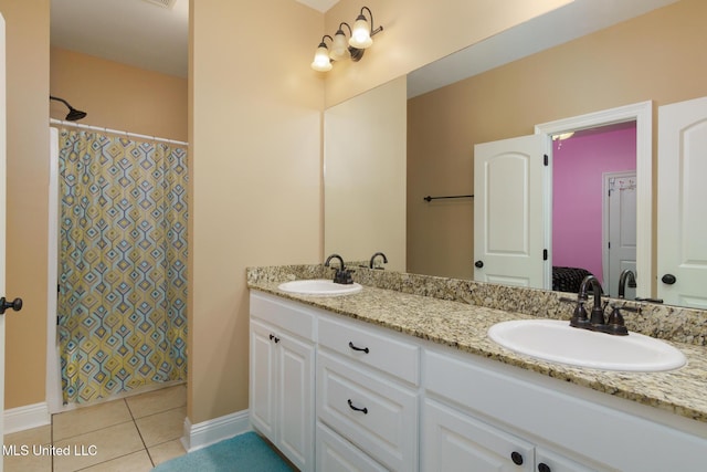 48 Harrell Rd, Hattiesburg, MS 39401 - bathroom featuring tile patterned flooring, double vanity, baseboards, and curtained shower