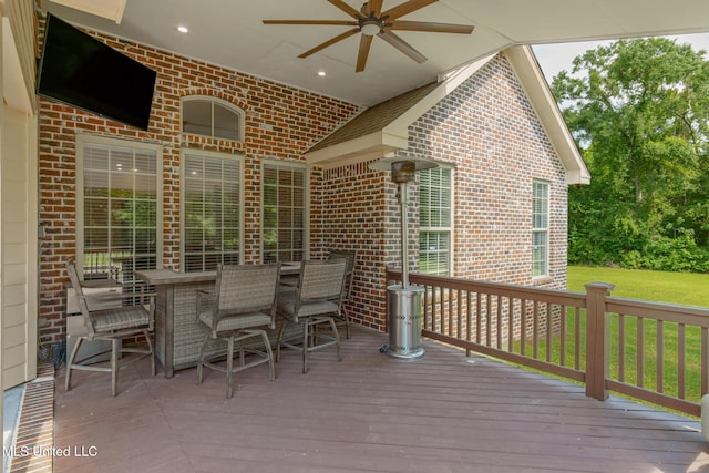 48 Harrell Rd, Hattiesburg, MS 39401 - deck with a ceiling fan and outdoor dining area