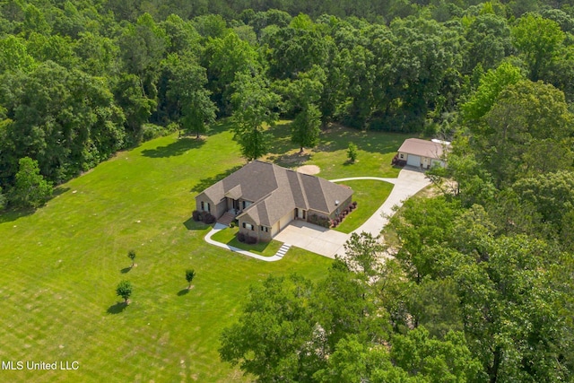 48 Harrell Rd, Hattiesburg, MS 39401 - aerial view of property and surrounding area with a heavily wooded area