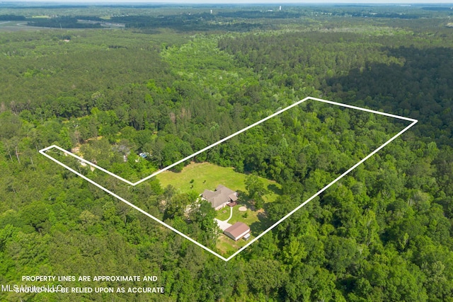 48 Harrell Rd, Hattiesburg, MS 39401 - aerial view of property and surrounding area with a forest and property parcel outlined