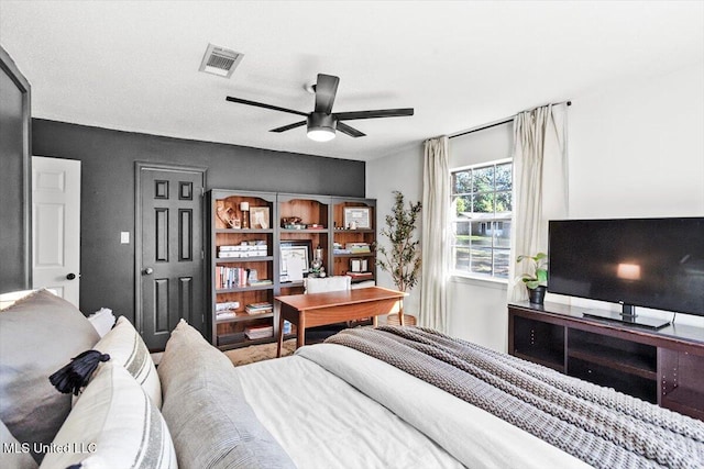 bedroom featuring ceiling fan