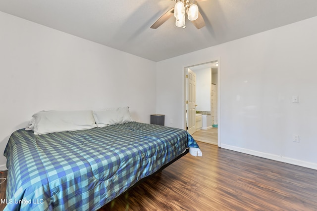 bedroom with dark hardwood / wood-style flooring, connected bathroom, and ceiling fan