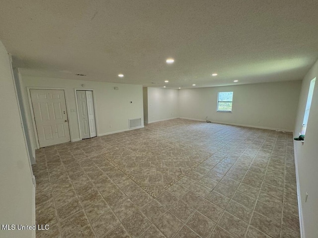 809 Herrick Ave, Pascagoula, MS 39567 - spare room featuring recessed lighting and a textured ceiling