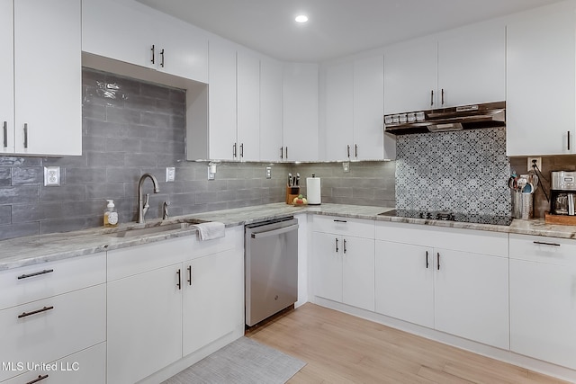 129 Marcie Dr, Long Beach, MS 39560 - kitchen with under cabinet range hood, dishwasher, black electric cooktop, a sink, and backsplash