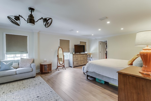 129 Marcie Dr, Long Beach, MS 39560 - bedroom with recessed lighting, crown molding, light wood finished floors, and baseboards