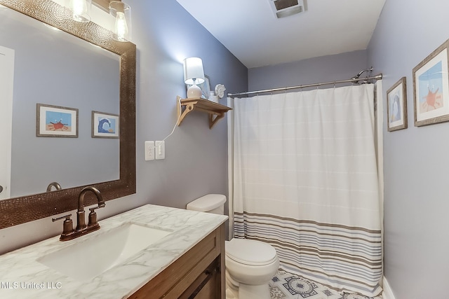129 Marcie Dr, Long Beach, MS 39560 - full bath with vanity, toilet, and a shower with curtain
