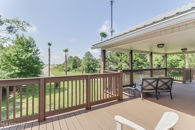 129 Marcie Dr, Long Beach, MS 39560 - deck featuring a lawn