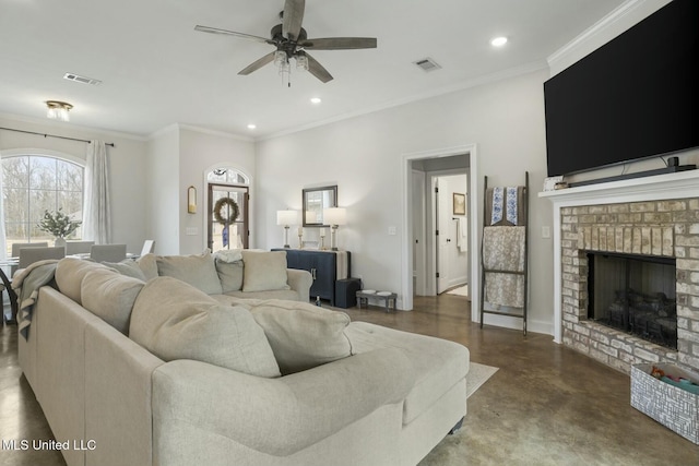 living room with concrete flooring, a brick fireplace, plenty of natural light, and ceiling fan