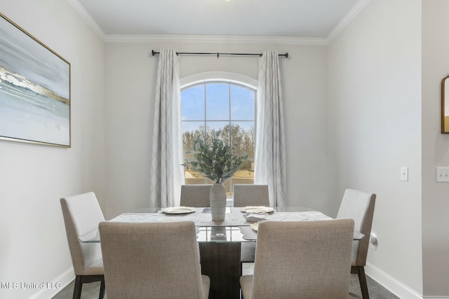 dining room featuring ornamental molding