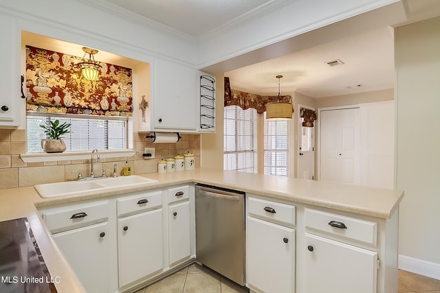 kitchen featuring dishwasher, kitchen peninsula, sink, decorative light fixtures, and white cabinets