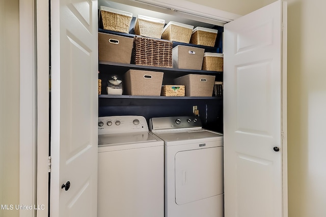 laundry area featuring washing machine and dryer