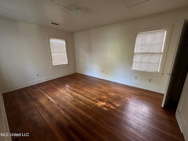500 Avery St, Cleveland, MS 38732 - empty room featuring dark wood finished floors and baseboards