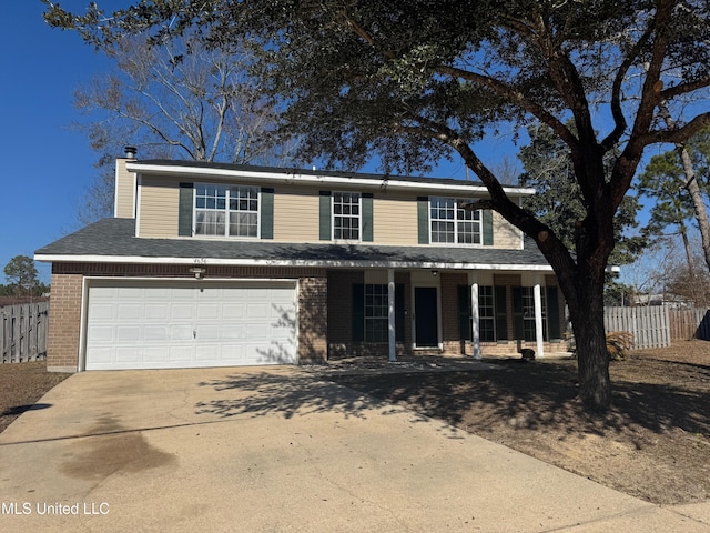 view of front of property with a garage