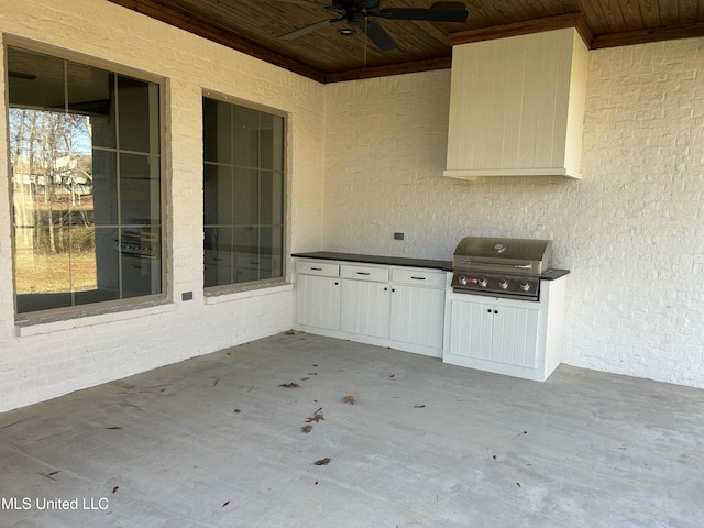 view of patio featuring ceiling fan and grilling area