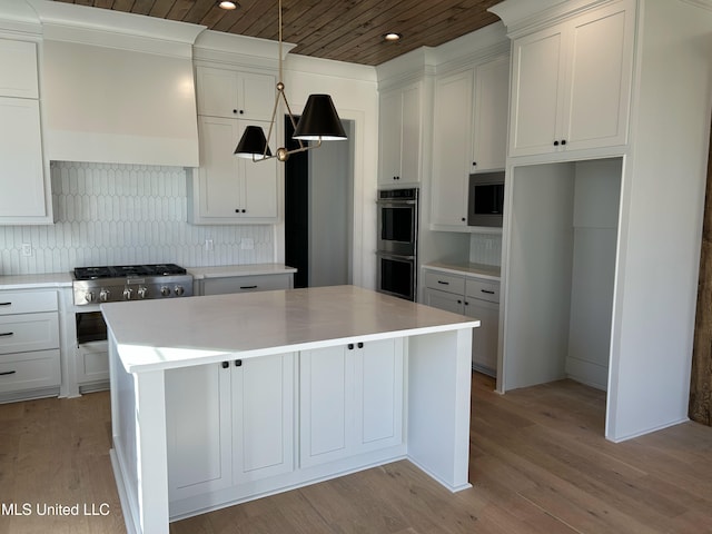 kitchen with a kitchen island, double oven, custom exhaust hood, and wood ceiling