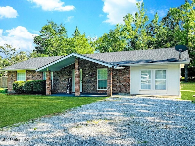 113 Richardson Rd, Picayune, MS 39466 - view of front facade featuring a front lawn and roof with shingles