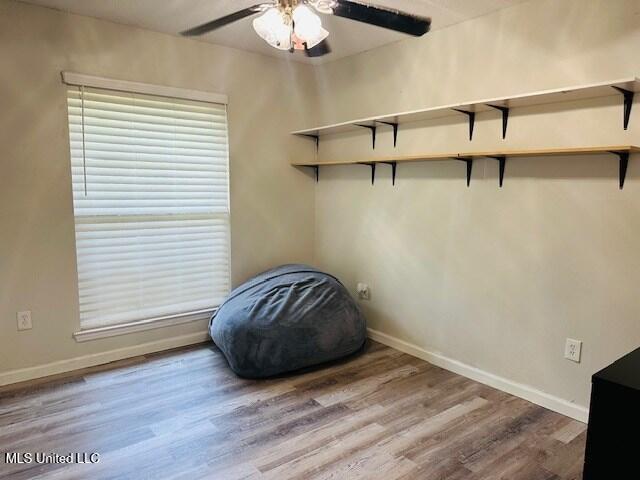 113 Richardson Rd, Picayune, MS 39466 - misc room featuring a ceiling fan, wood finished floors, and baseboards
