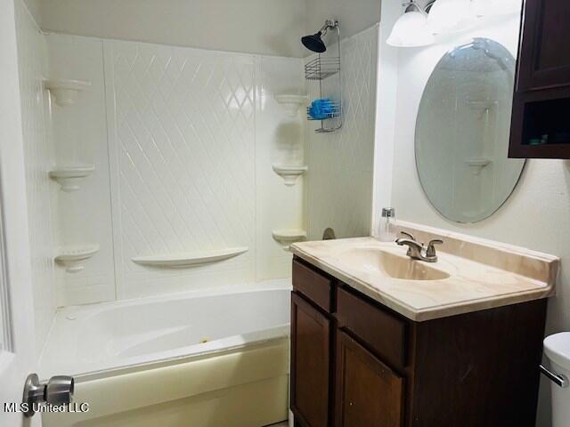 113 Richardson Rd, Picayune, MS 39466 - full bath with toilet, vanity, and tub / shower combination