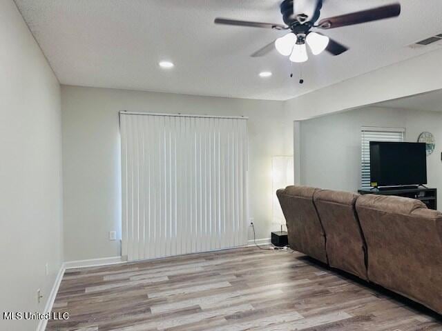 113 Richardson Rd, Picayune, MS 39466 - living room with a ceiling fan, wood finished floors, recessed lighting, and baseboards
